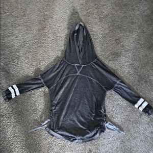 long sleeve hooded tee. Ties down the side.